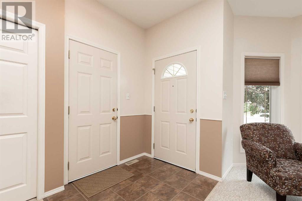 90 Peigan Court W