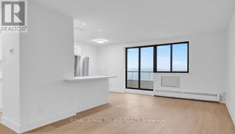 402 - 671 WOOLWICH STREET Guelph (Riverside Park) ON N1H3Y9