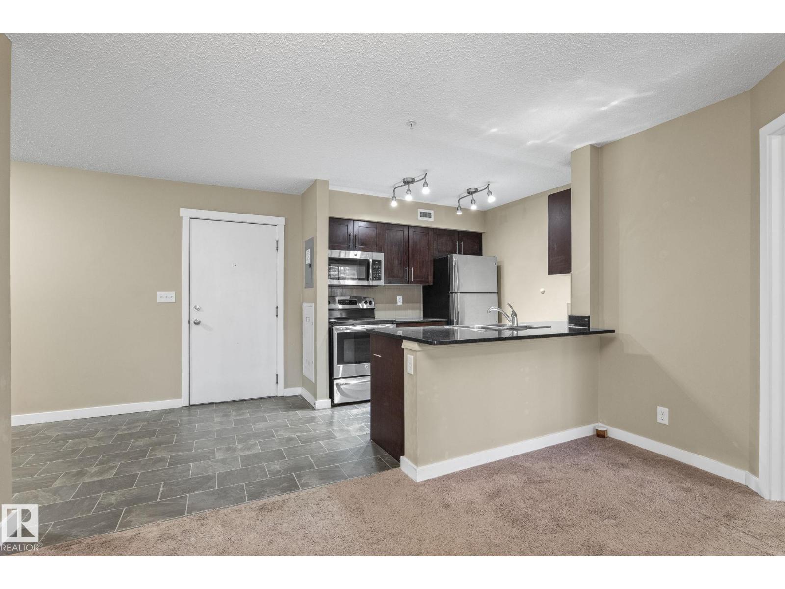 #116 12025 22 AV SW
