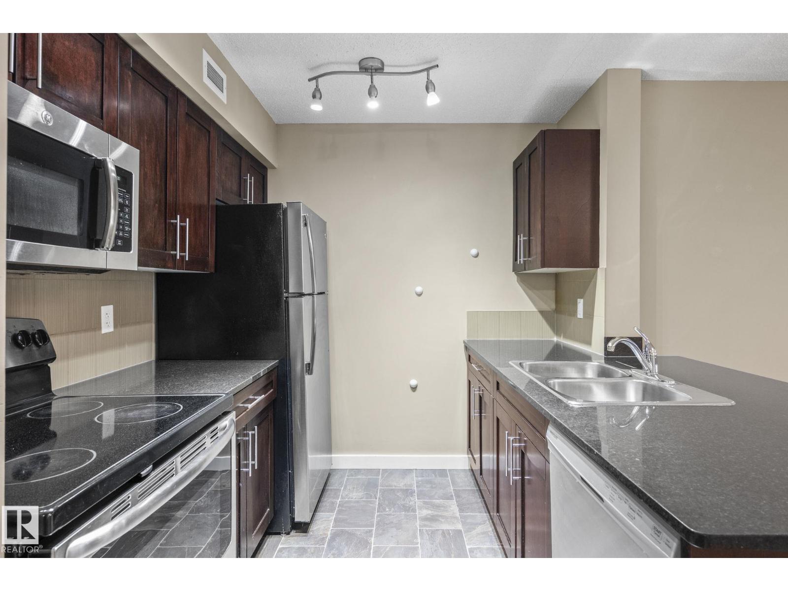 #116 12025 22 AV SW