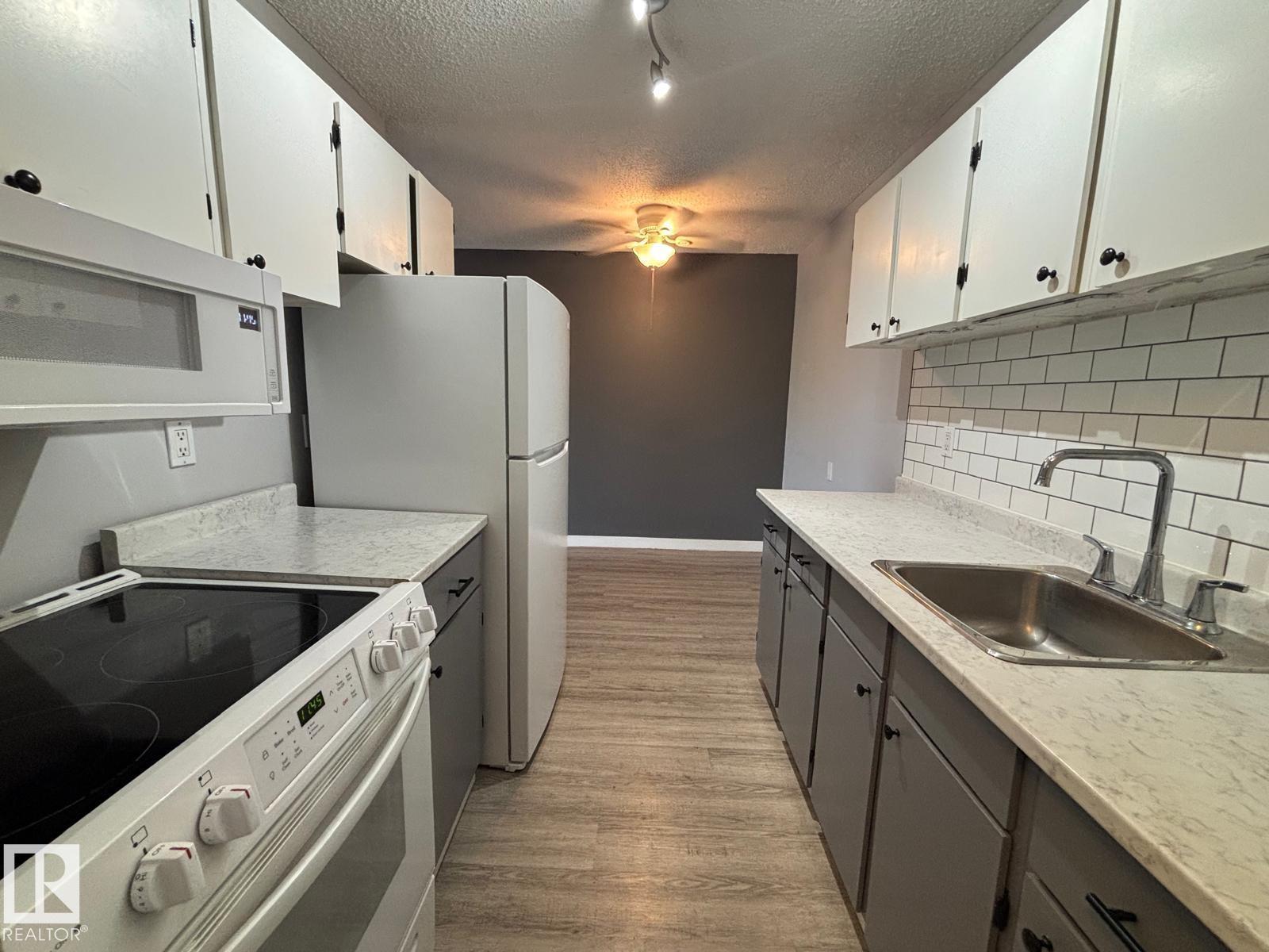 #323 15105 121 ST NW