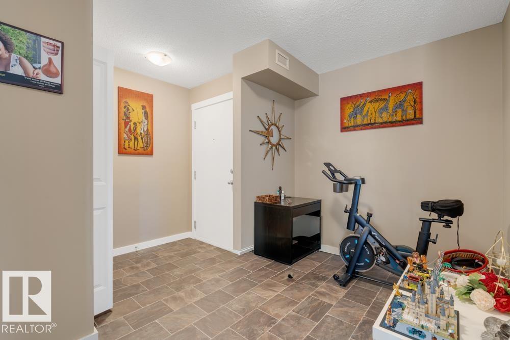 #102 5816 MULLEN PL NW