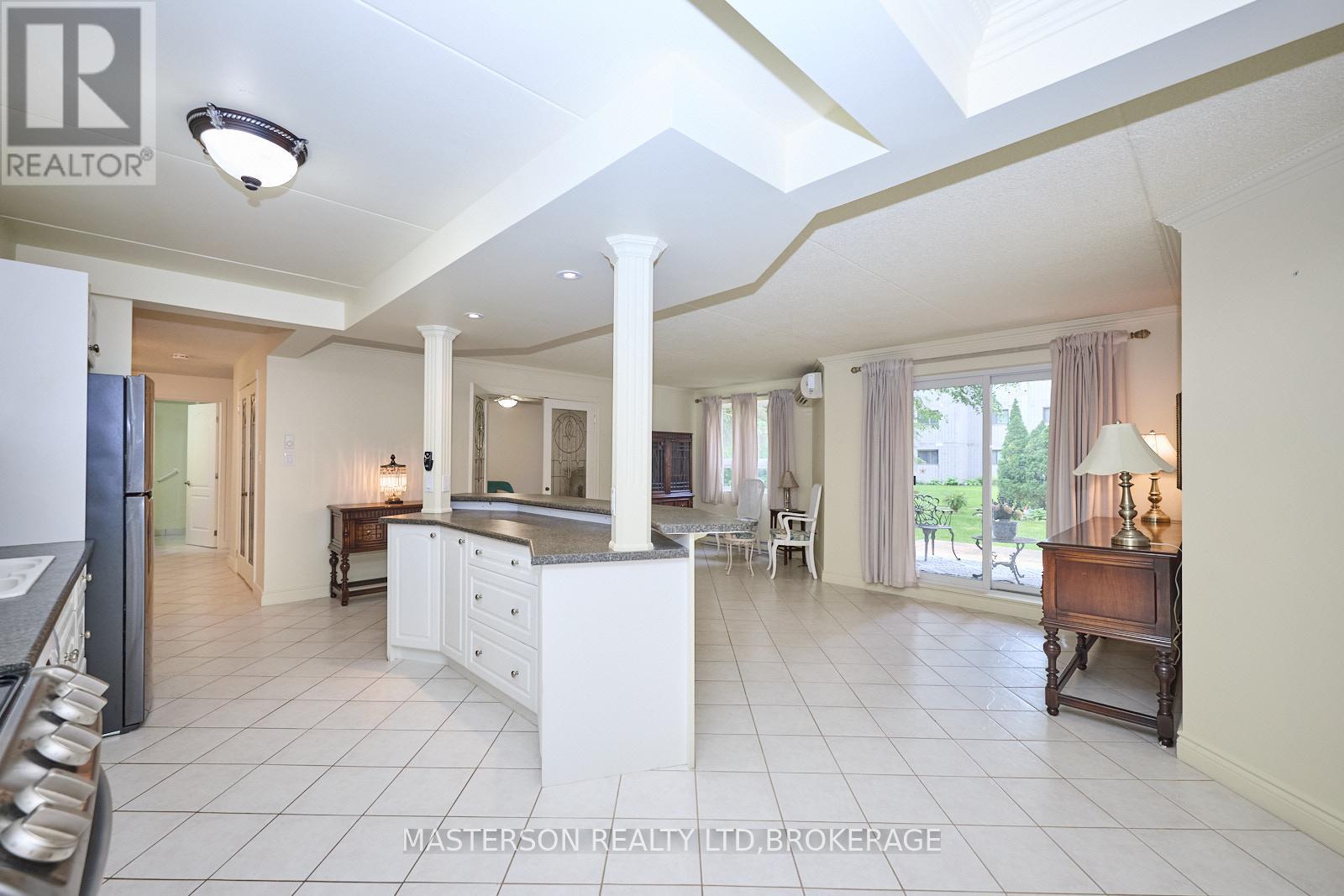 121 - 4658 DRUMMOND ROAD S