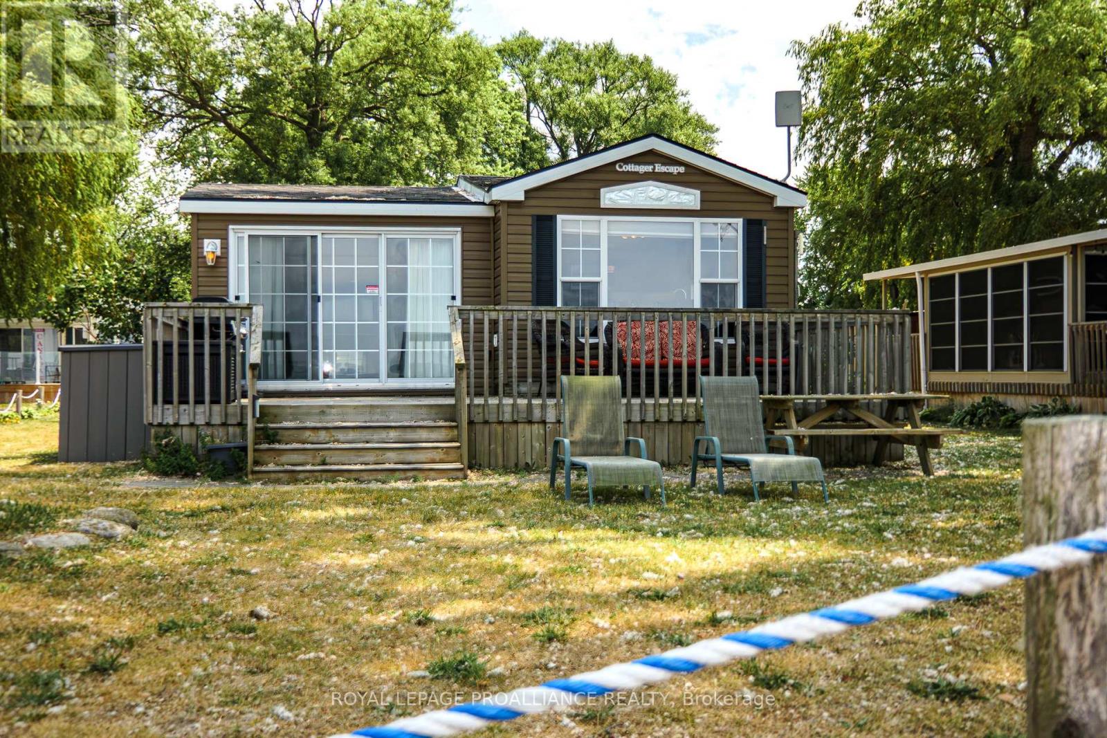 Photo 1 of 48 — 13 BEACH VIEW LANE - 486 COUNTY ROAD 18, Prince Edward County (Athol Ward), ON K0K1P0