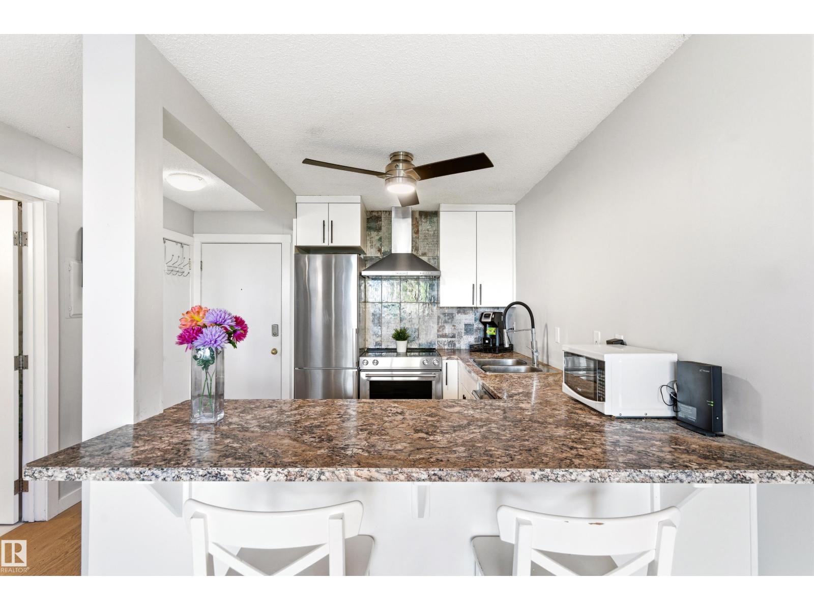 #105 10230 120 Street NW ST NW NW