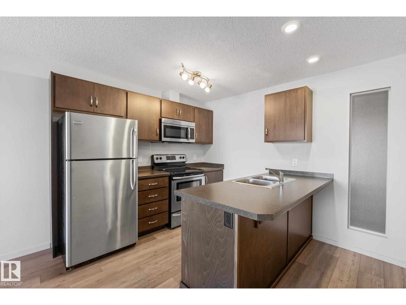 #405 7711 71 ST NW