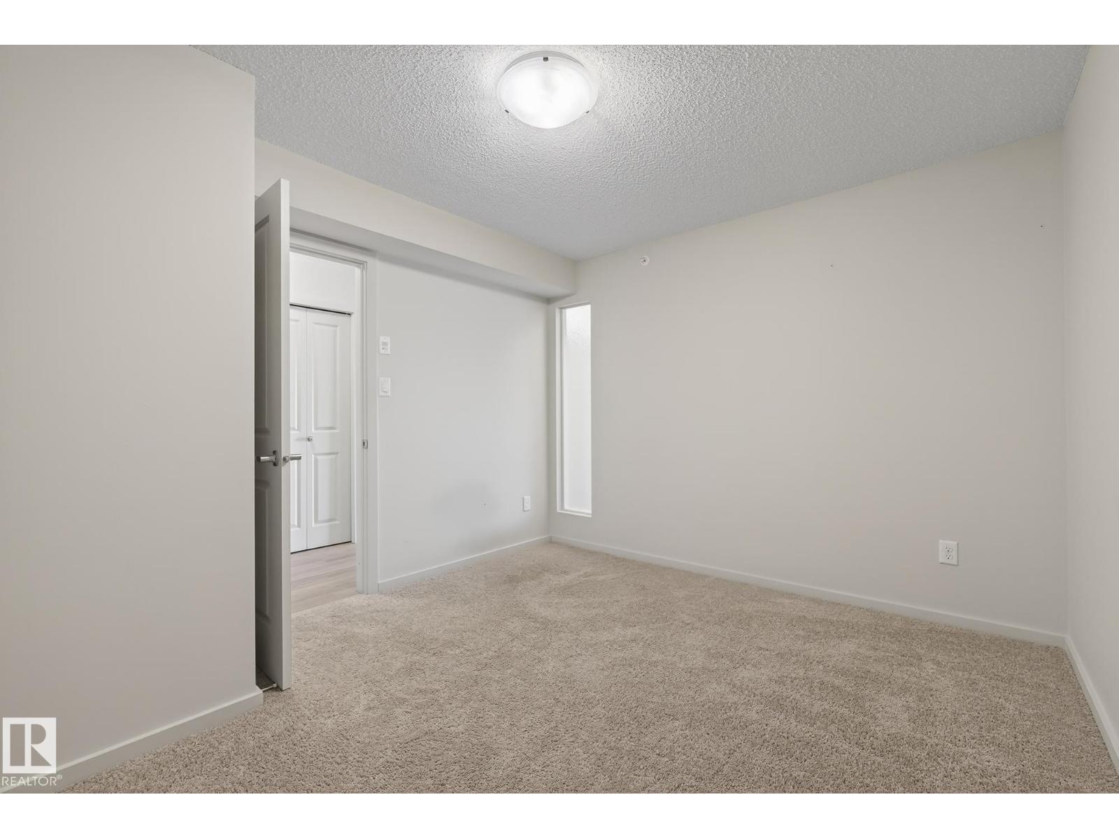 #405 7711 71 ST NW
