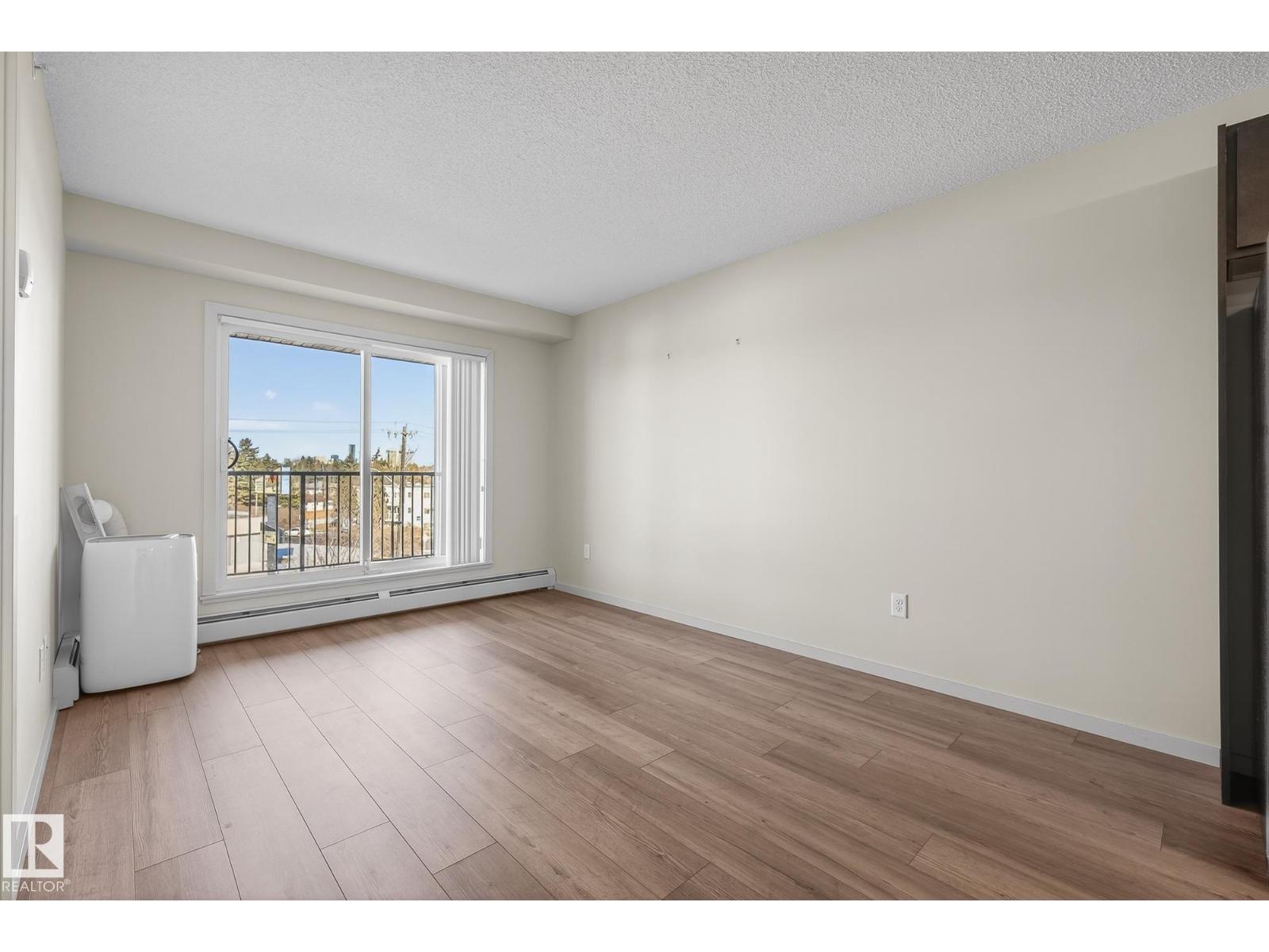 #405 7711 71 ST NW