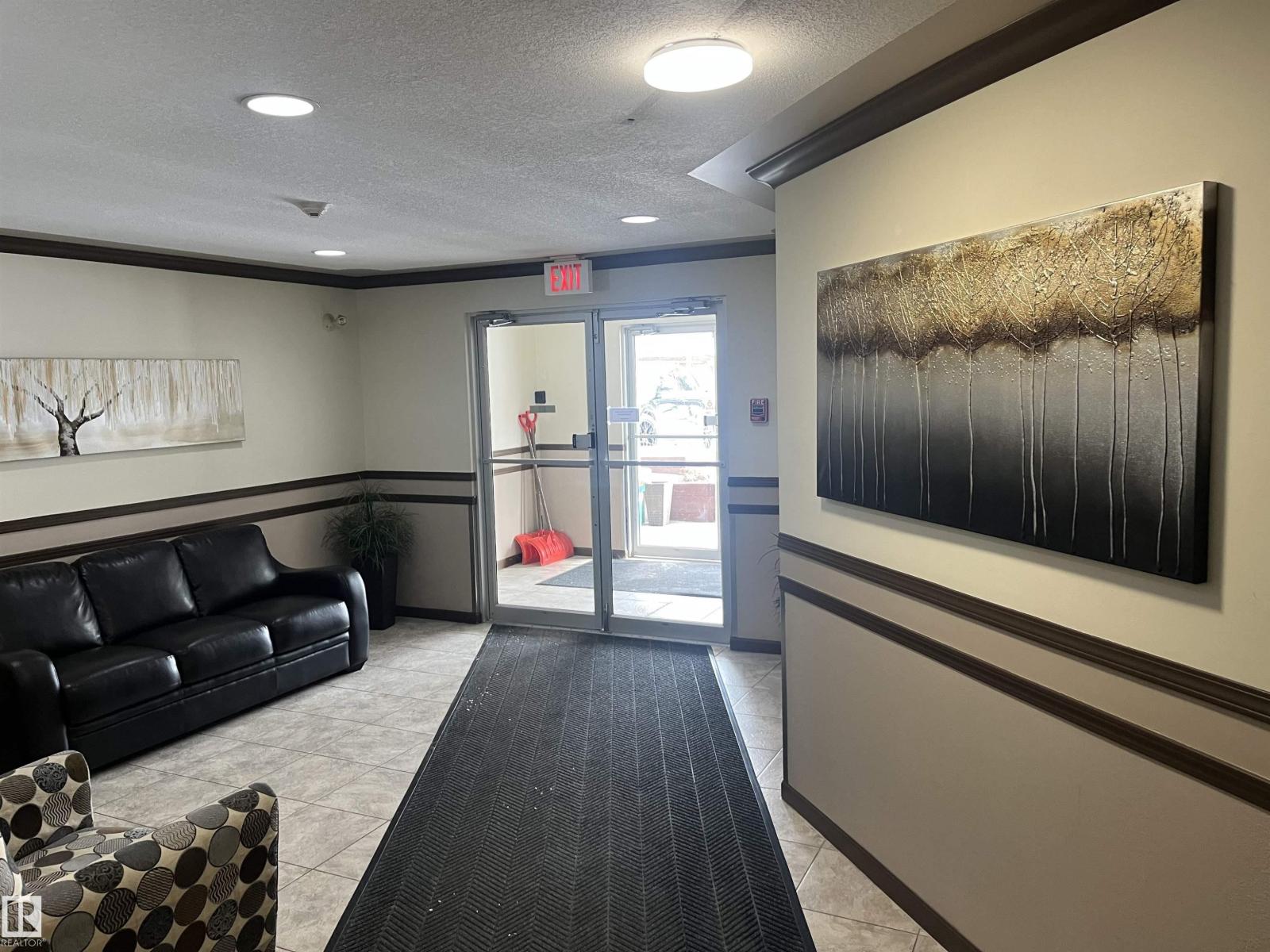 #302 17467 98A AV NW