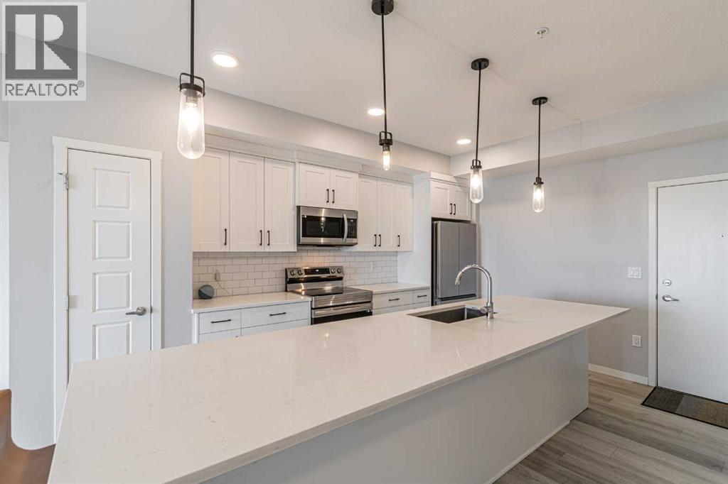 203, 360 Harvest Hills Way NE