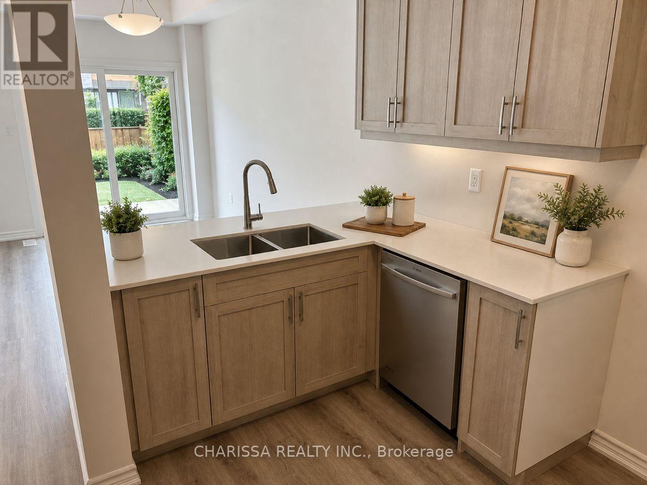 102 - 461 BLACKBURN DRIVE
