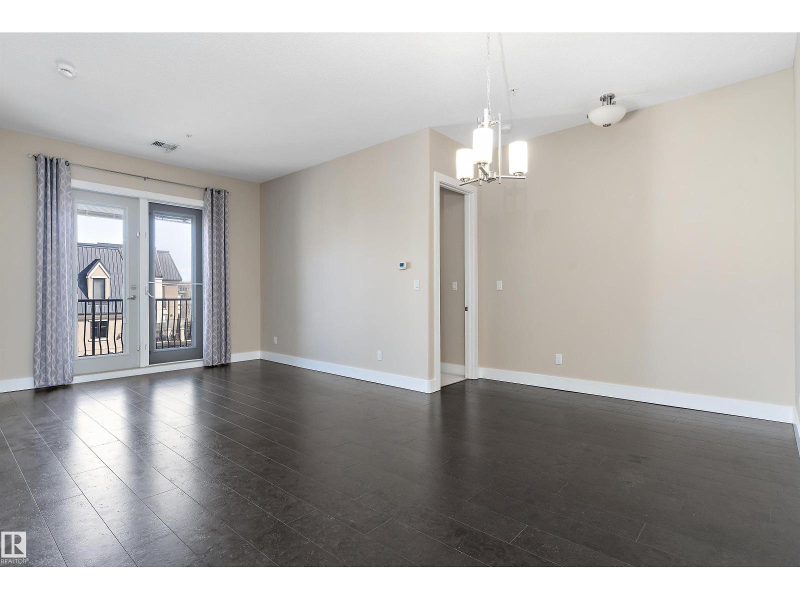#449 6079 MAYNARD WY NW