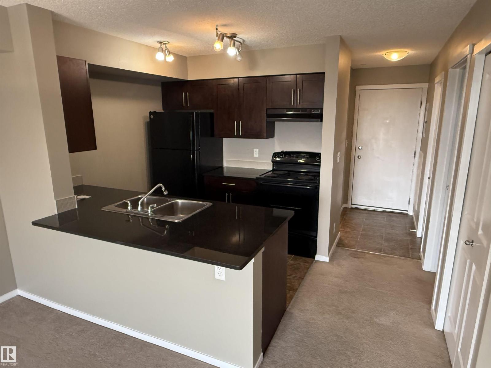 #310 5810 MULLEN PL NW