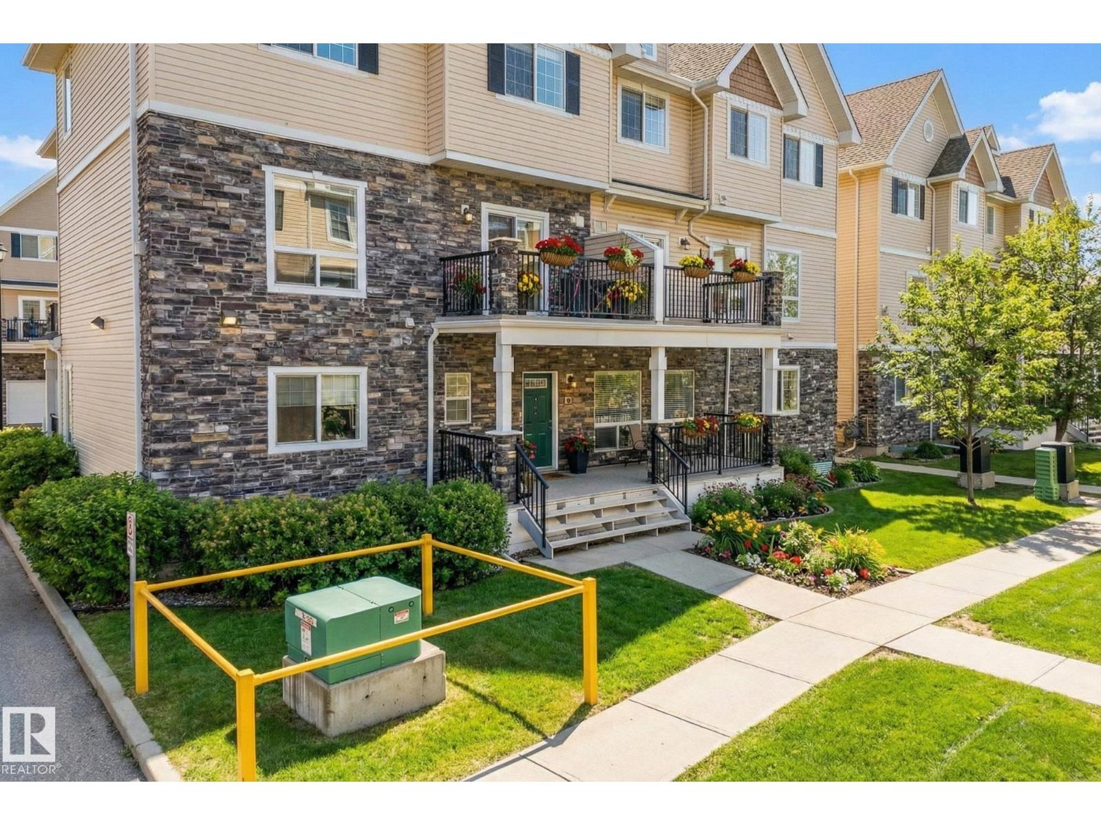 #58 7293 SOUTH TERWILLEGAR DR NW