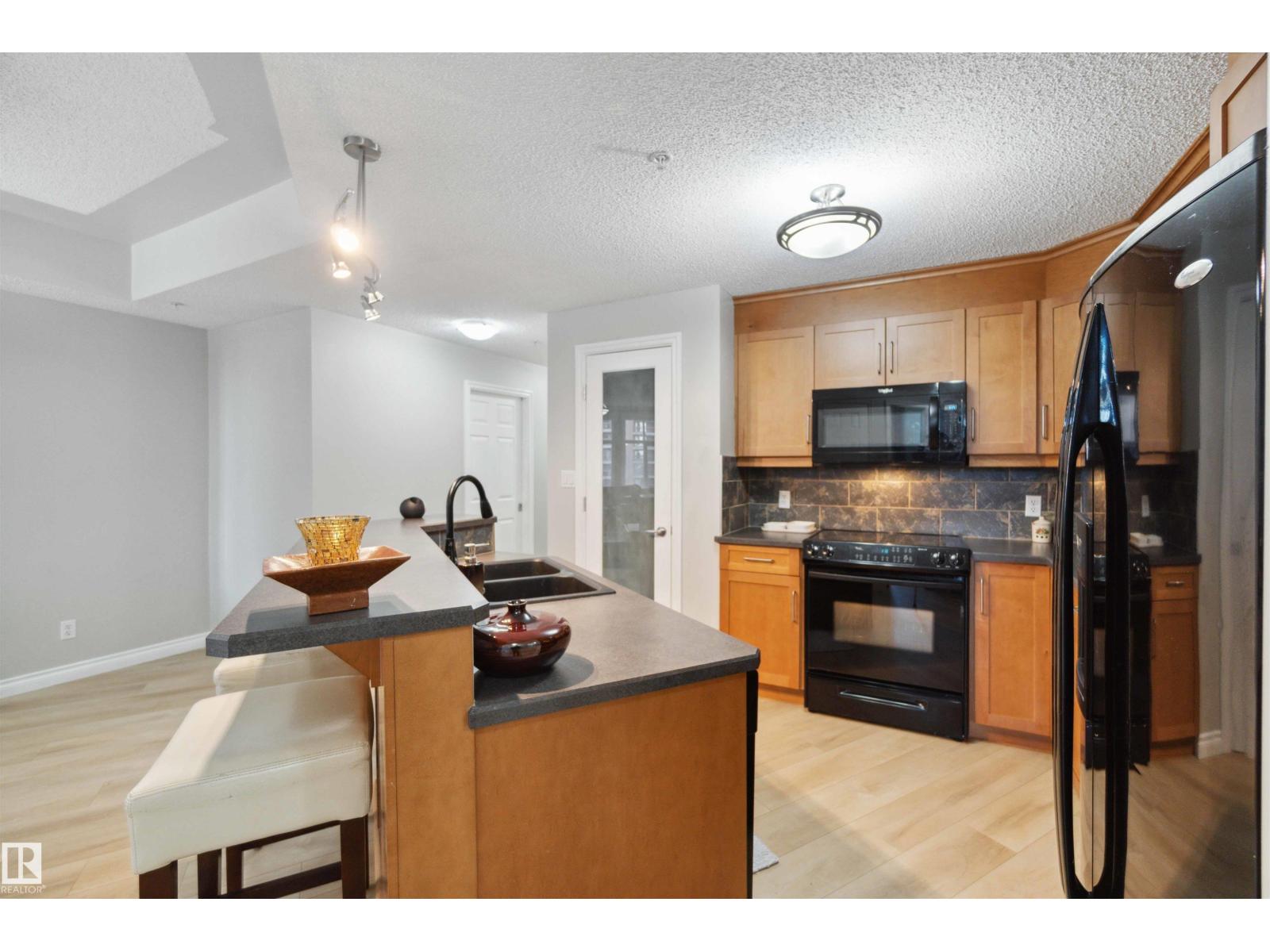 #402 9020 JASPER AV NW