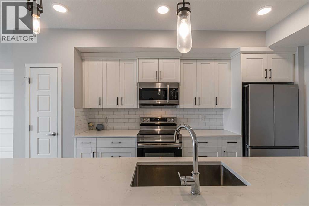 203, 360 Harvest Hills Way NE