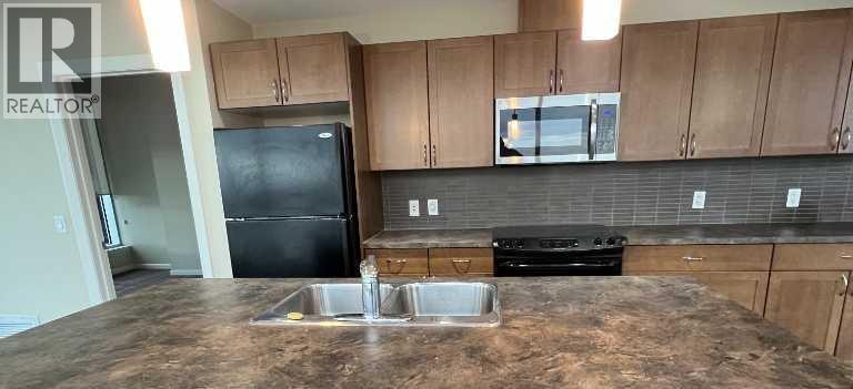 2607, 211 13 Avenue SE