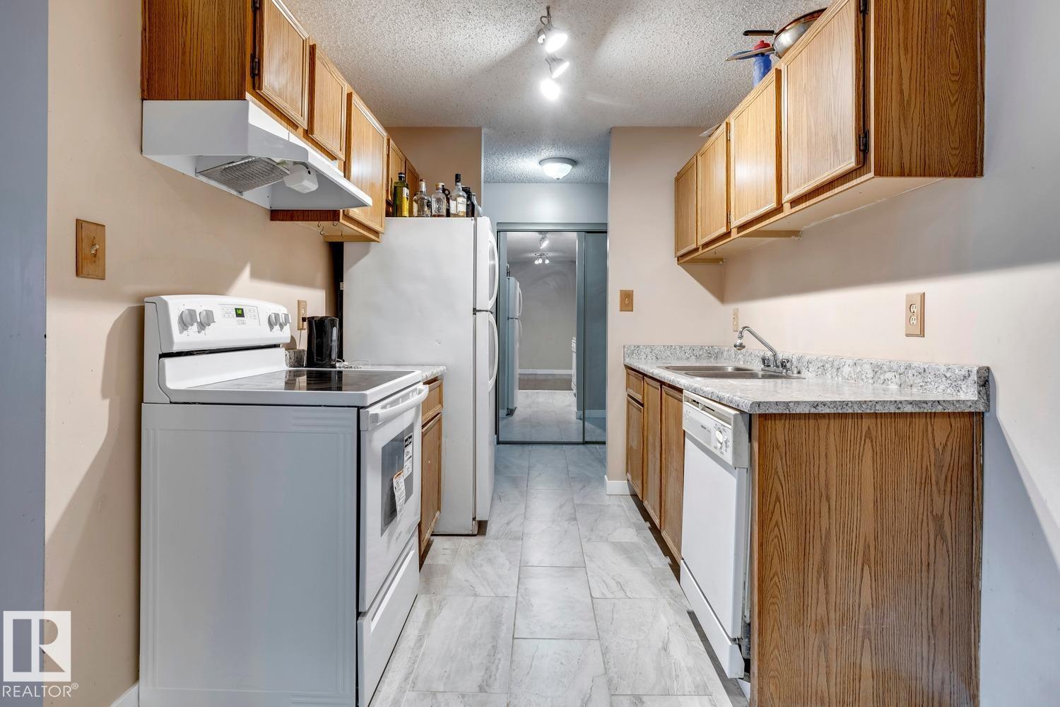 #302 11115 74 ST NW