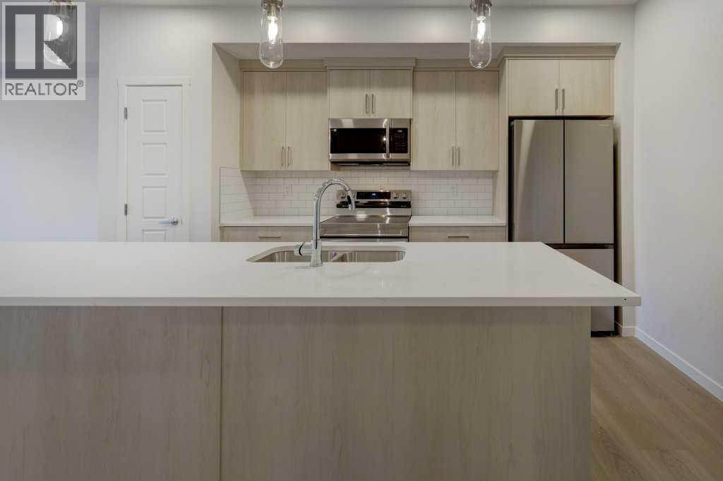 308, 245 Edith Place NW