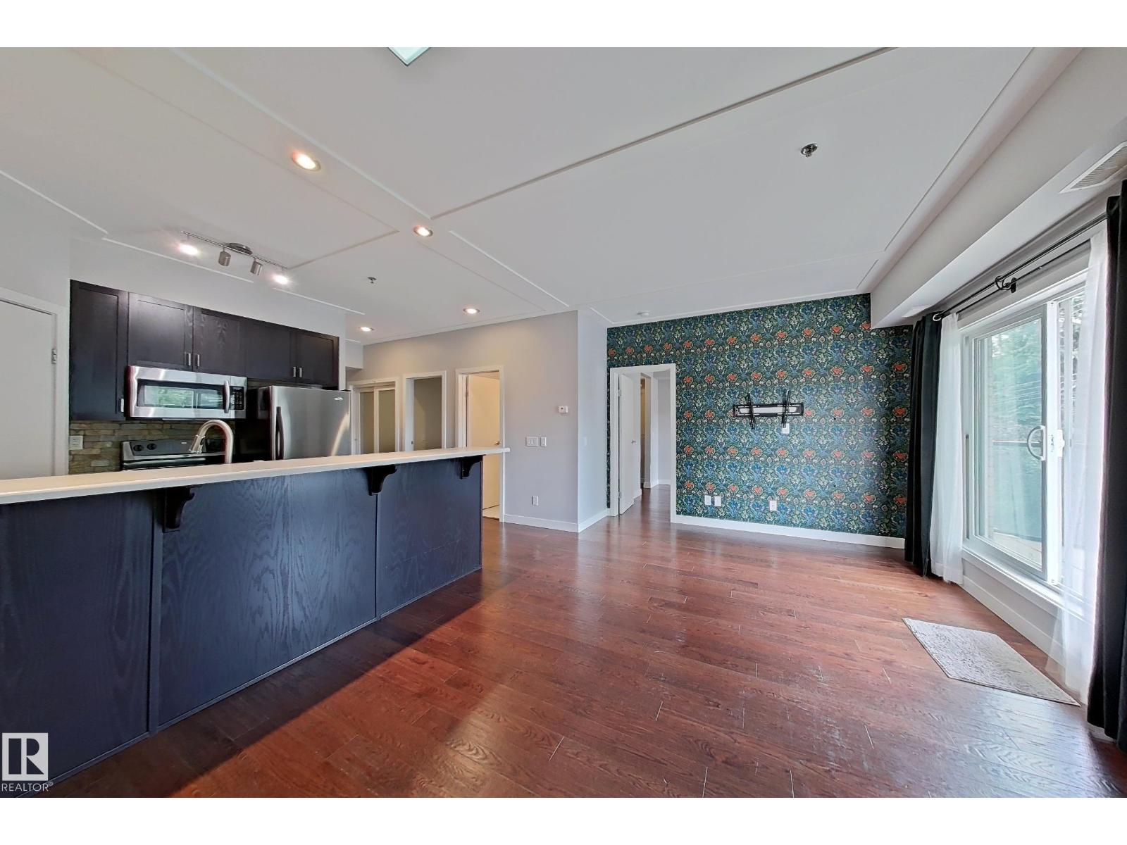 #207 9750 94 ST NW