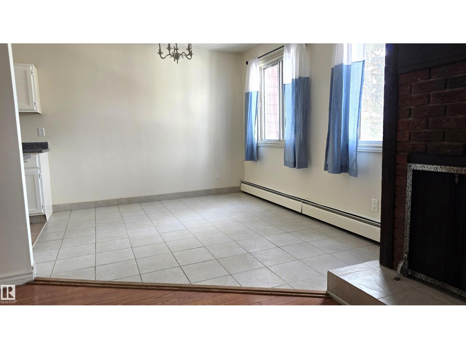 #202 10826 113 ST NW NW