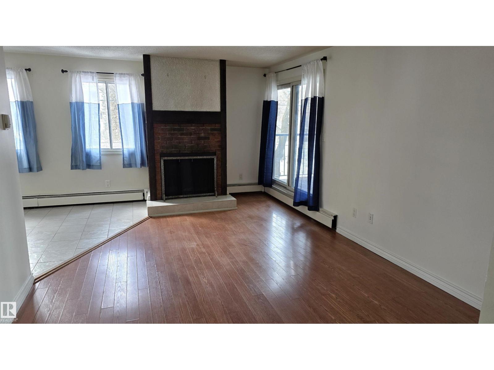 #202 10826 113 ST NW NW