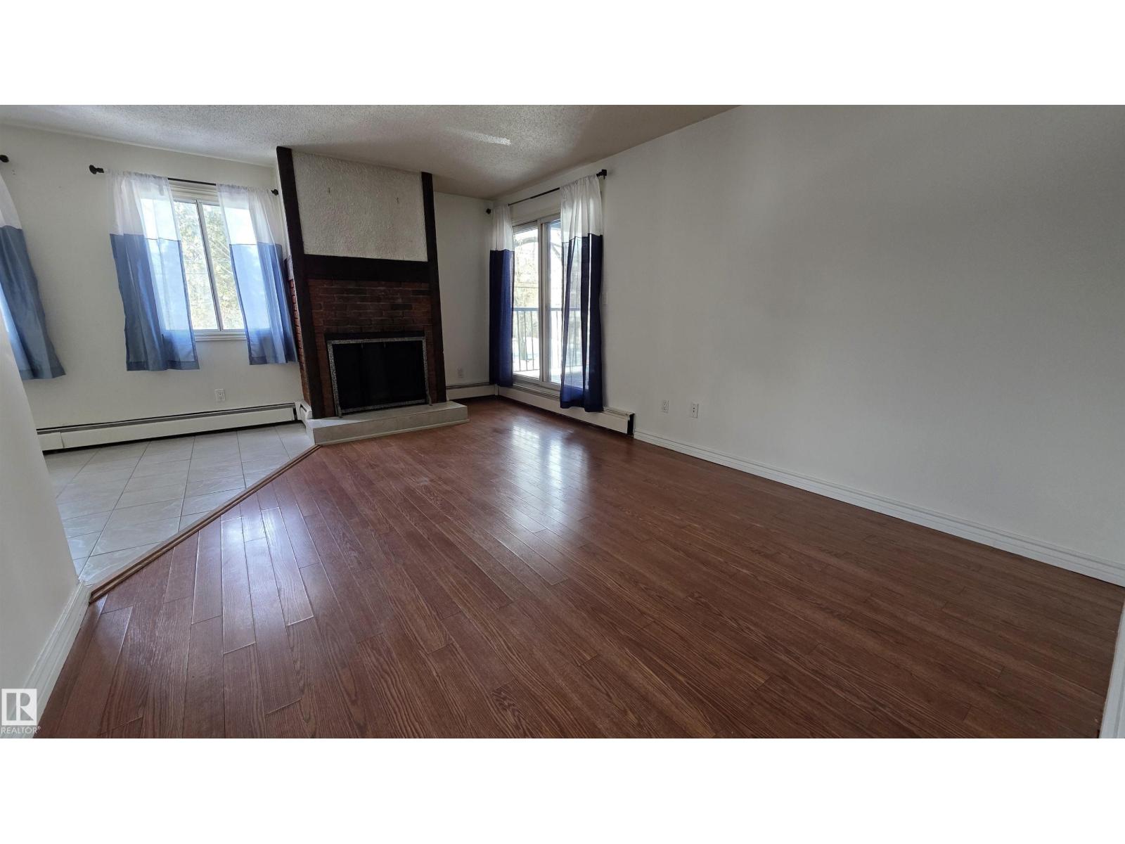 #202 10826 113 ST NW NW