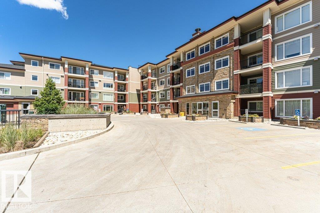 #207 7021 SOUTH TERWILLEGAR DR NW