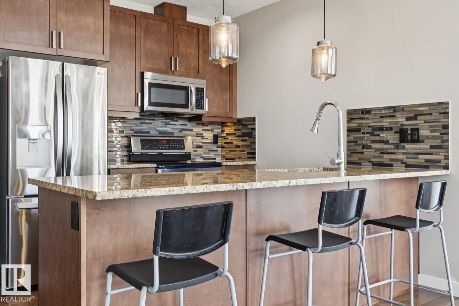 #808 10238 103 ST NW