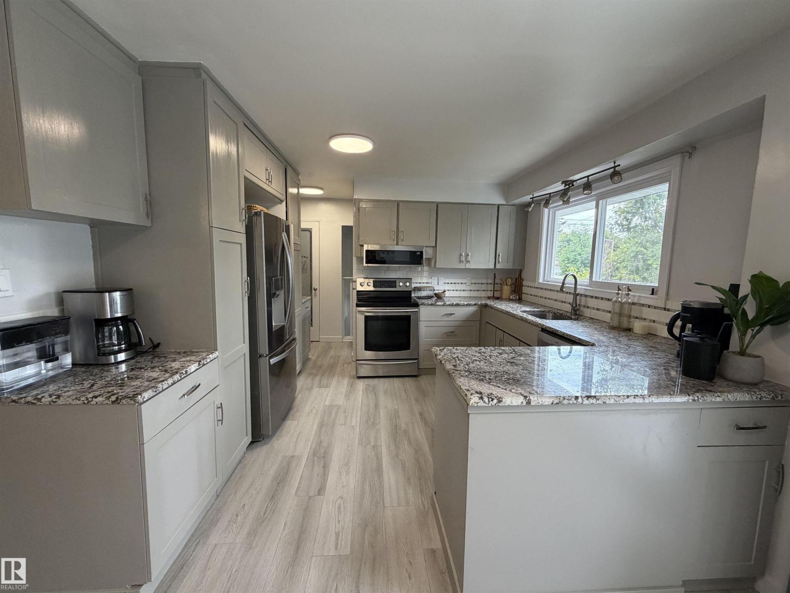 9304 128A AV NW