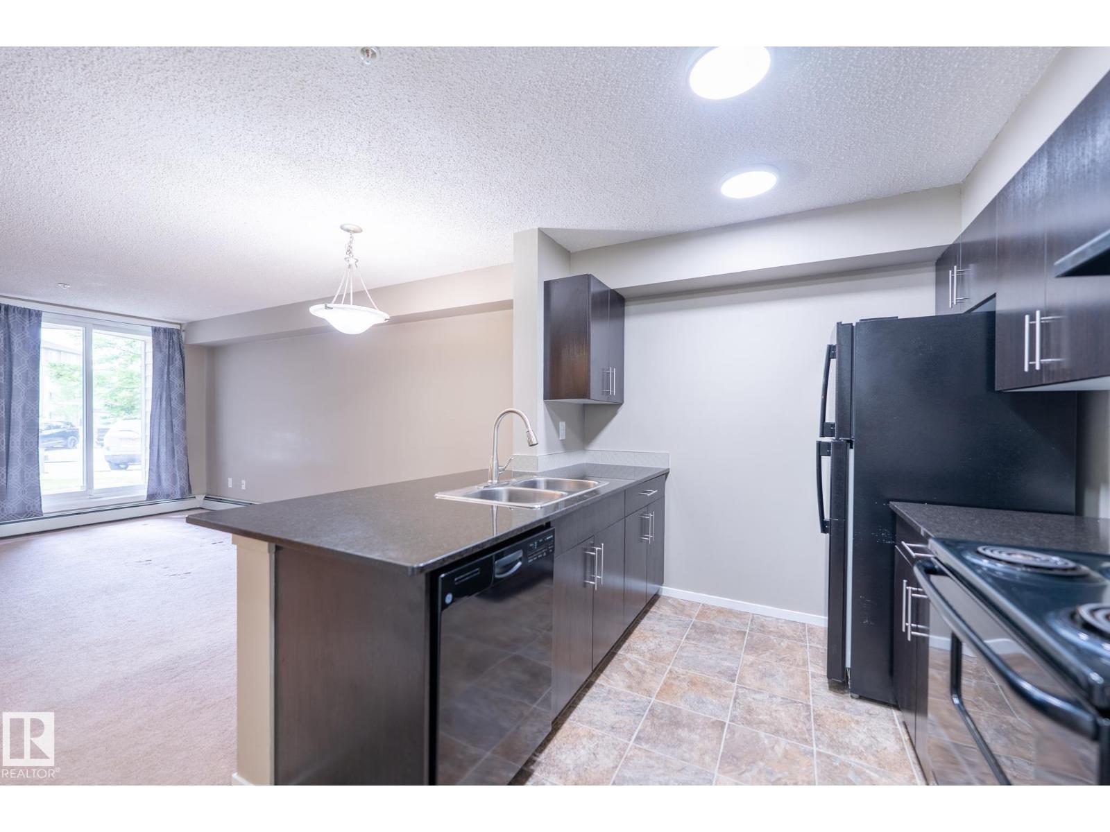 #108 18122 77 ST NW