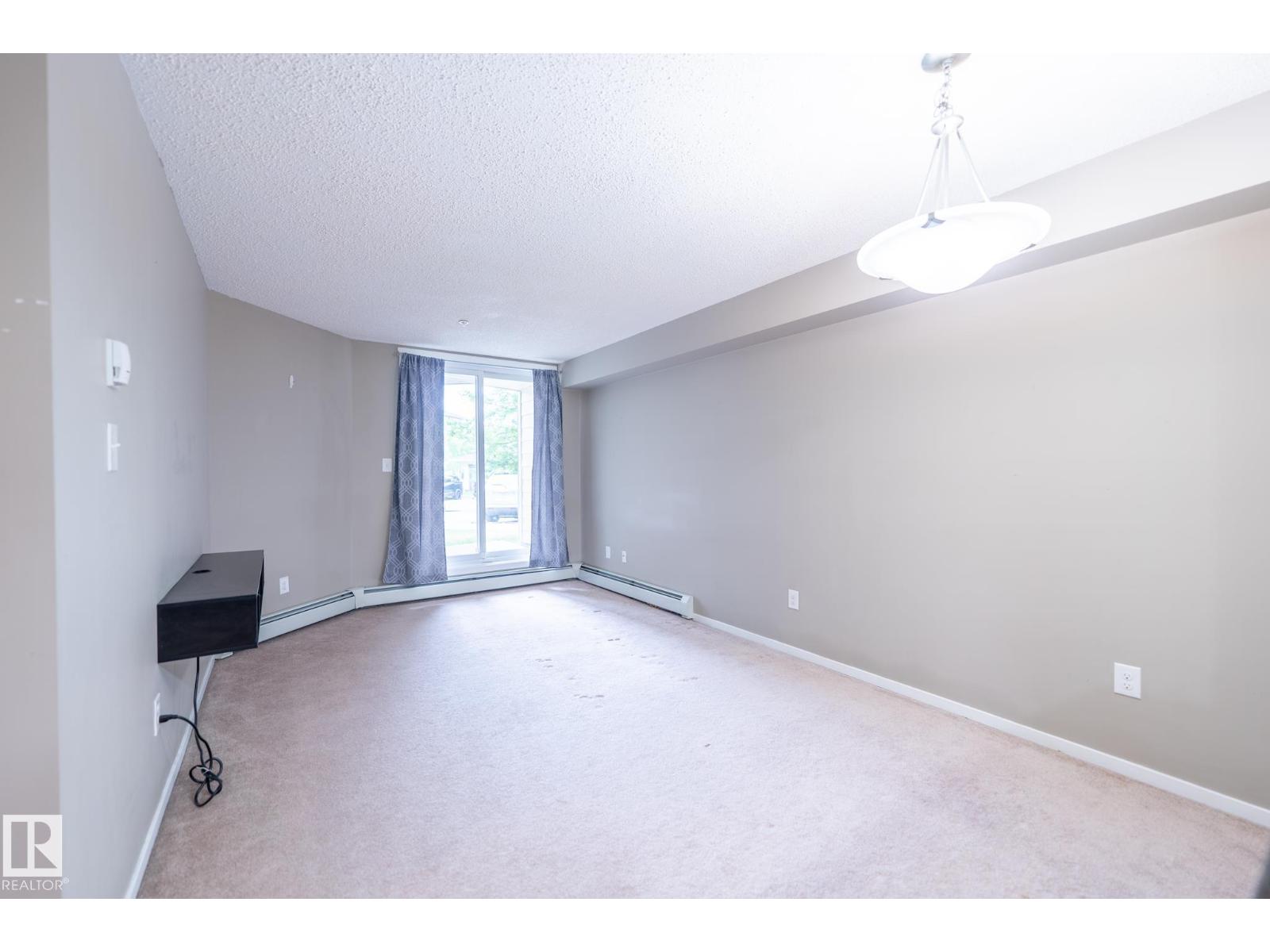 #108 18122 77 ST NW