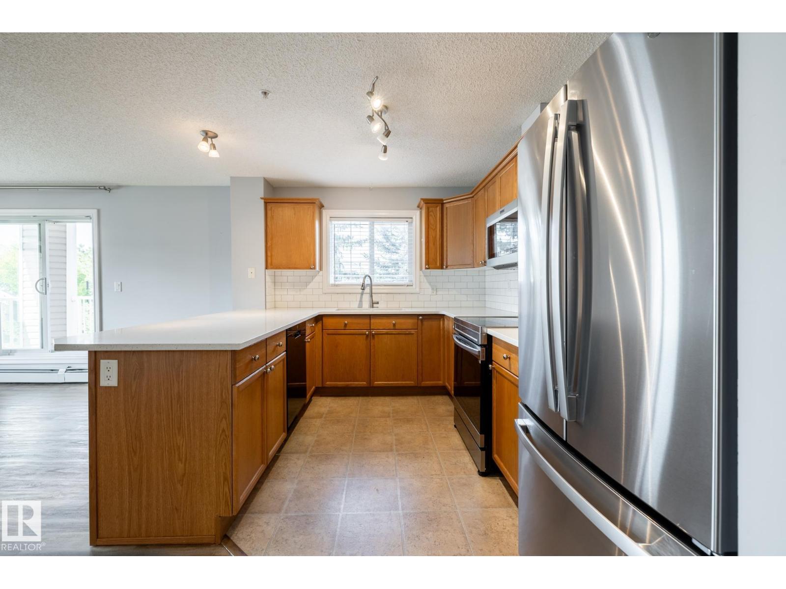 #201 4407 23 ST NW