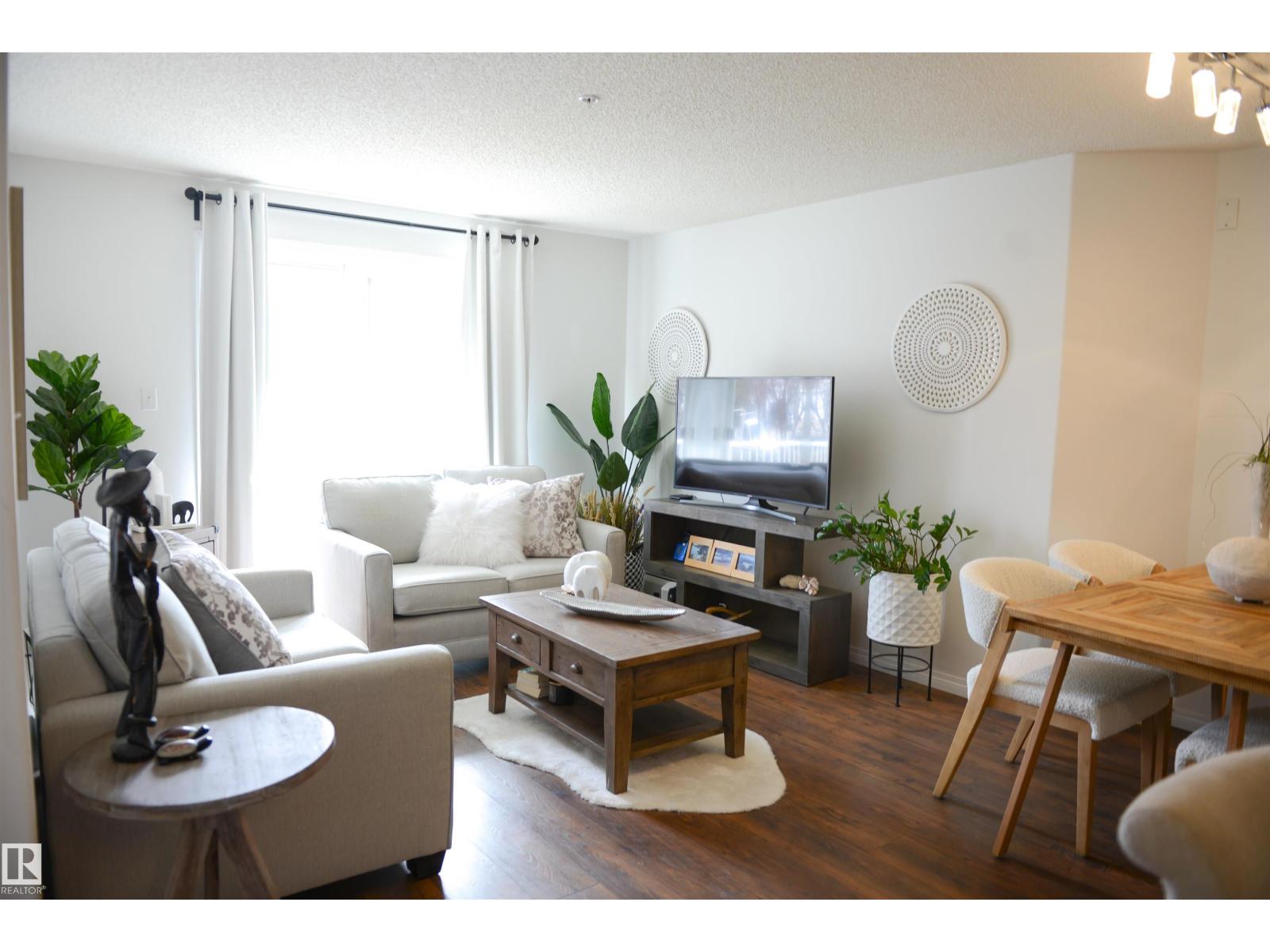 #114 155 EDWARDS DR SW