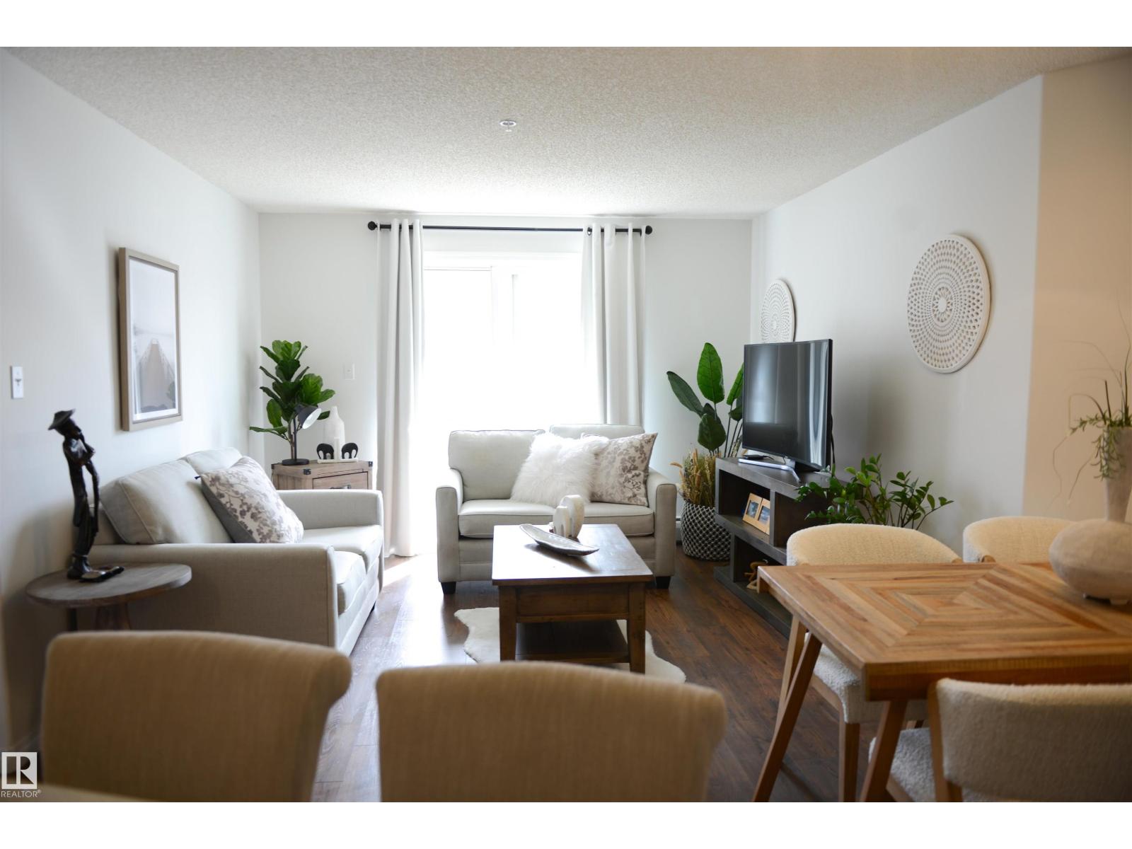 #114 155 EDWARDS DR SW