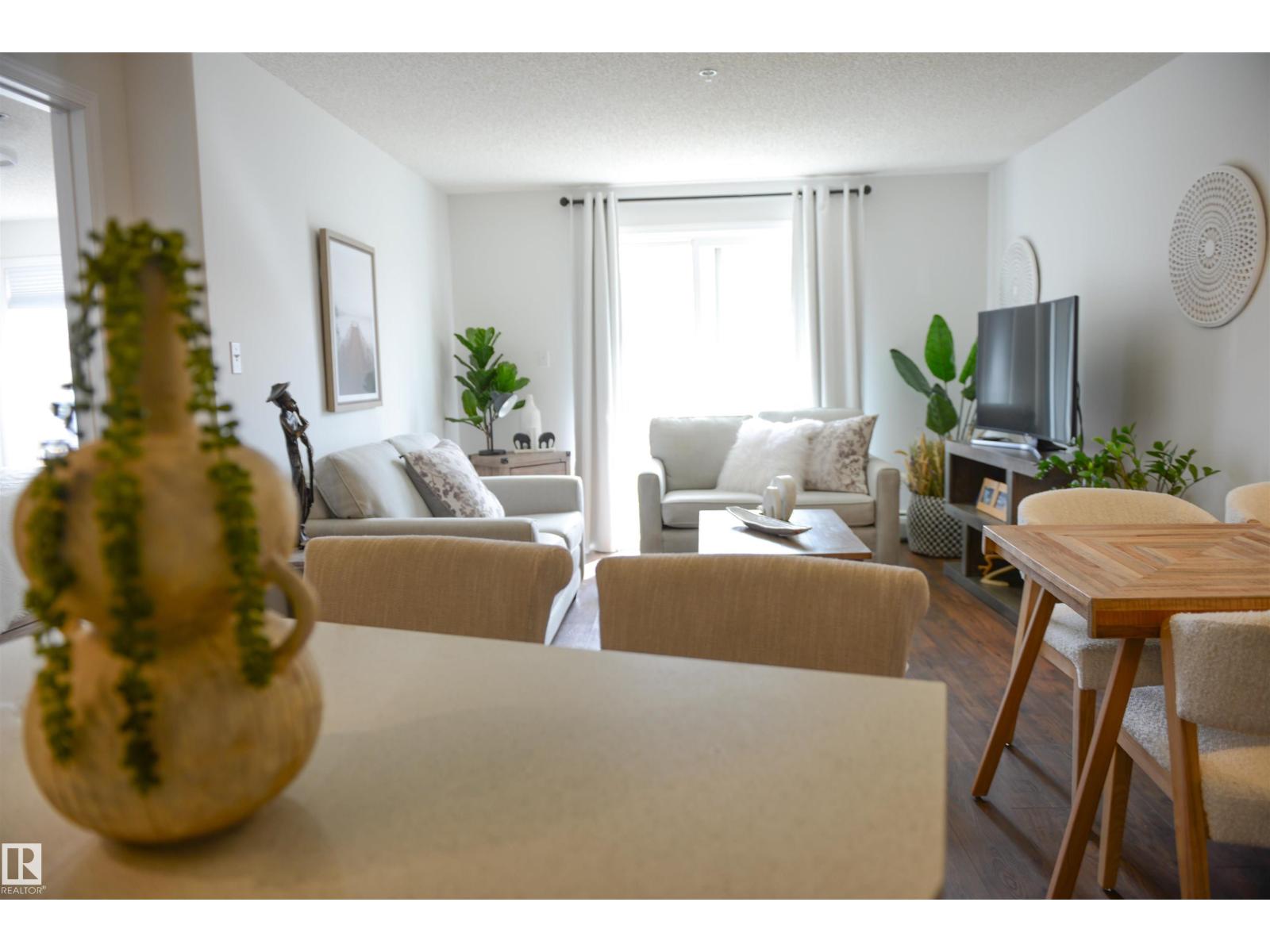 #114 155 EDWARDS DR SW