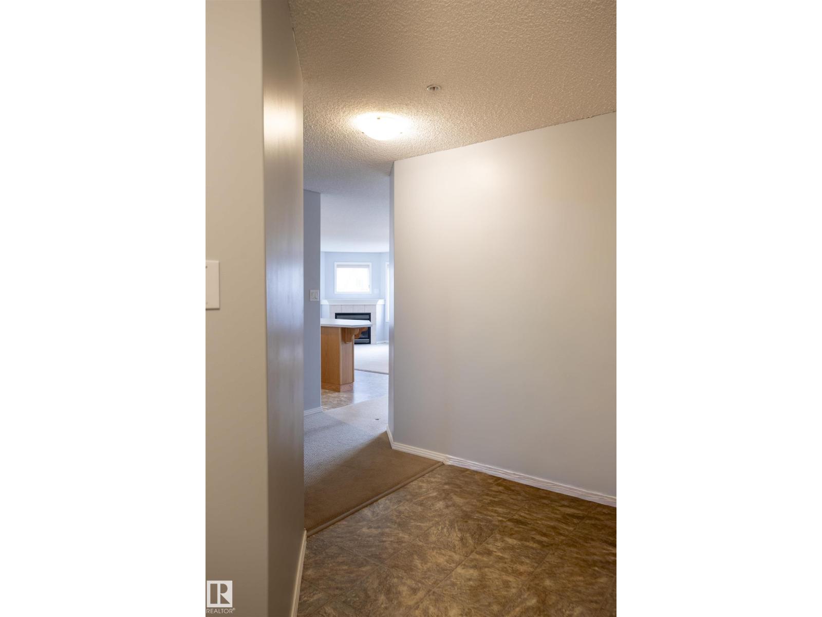 #101 2420 108 ST NW