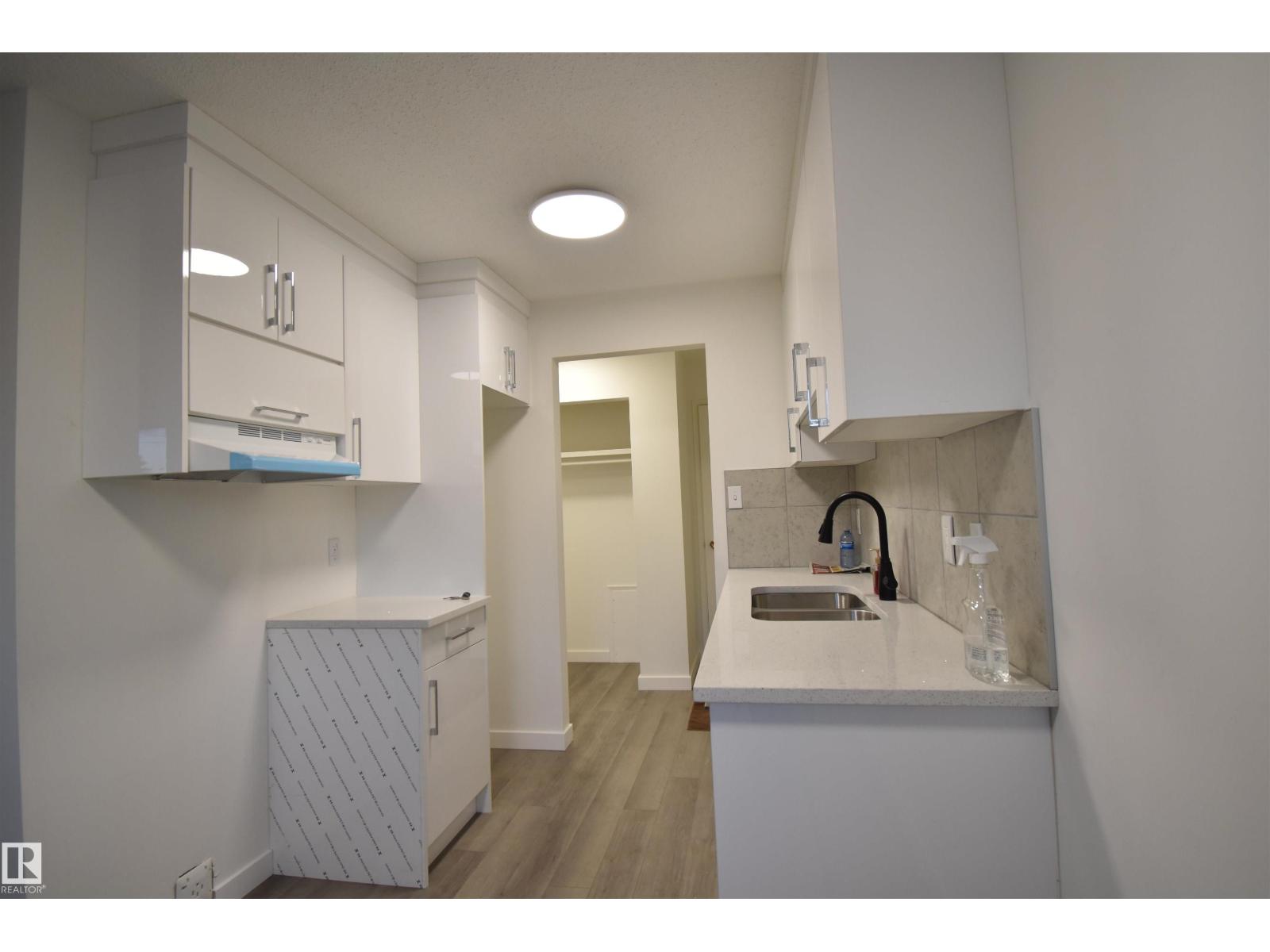 #303 12921 127 ST NW