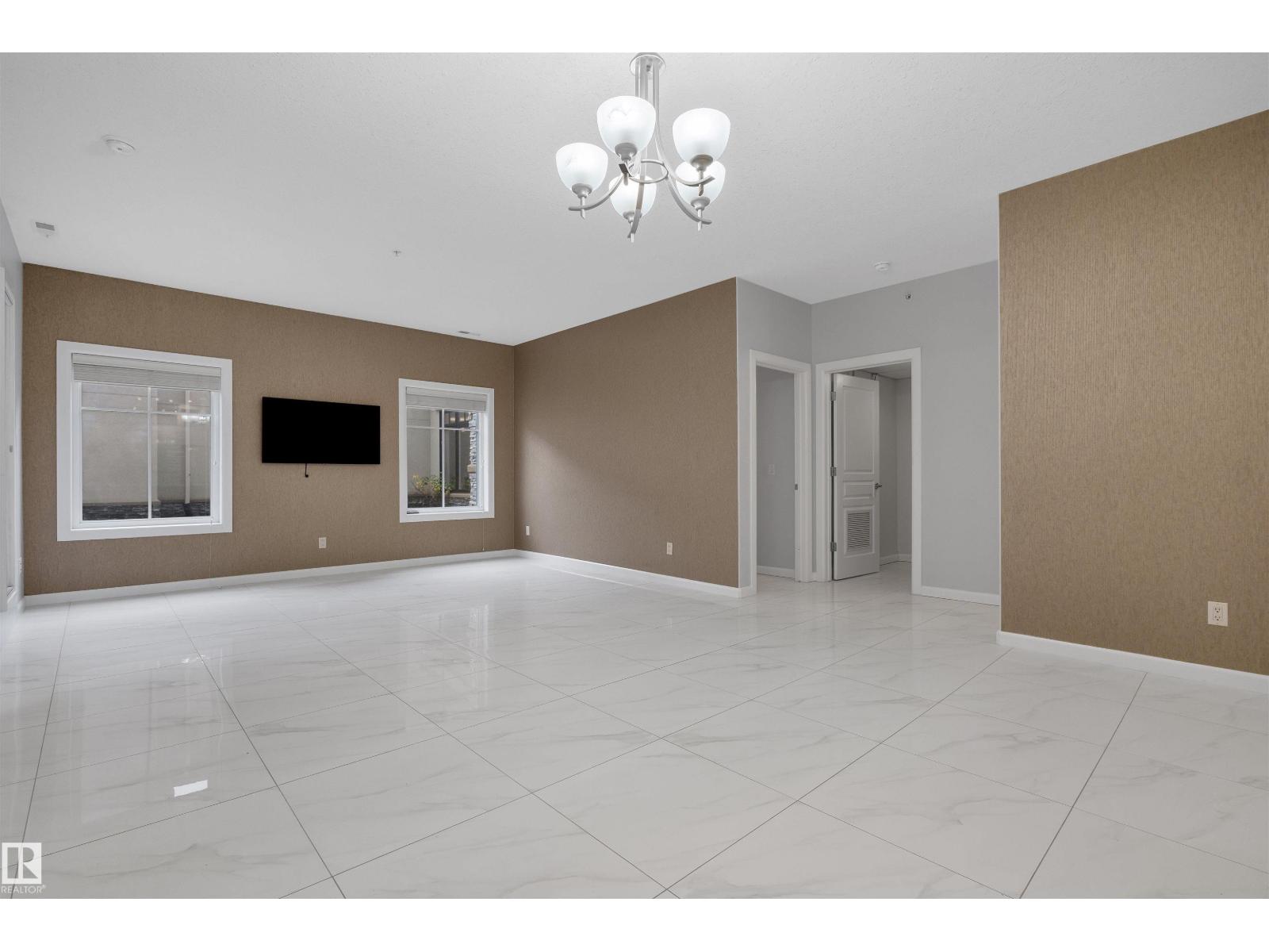 #105 160 Magrath RD NW