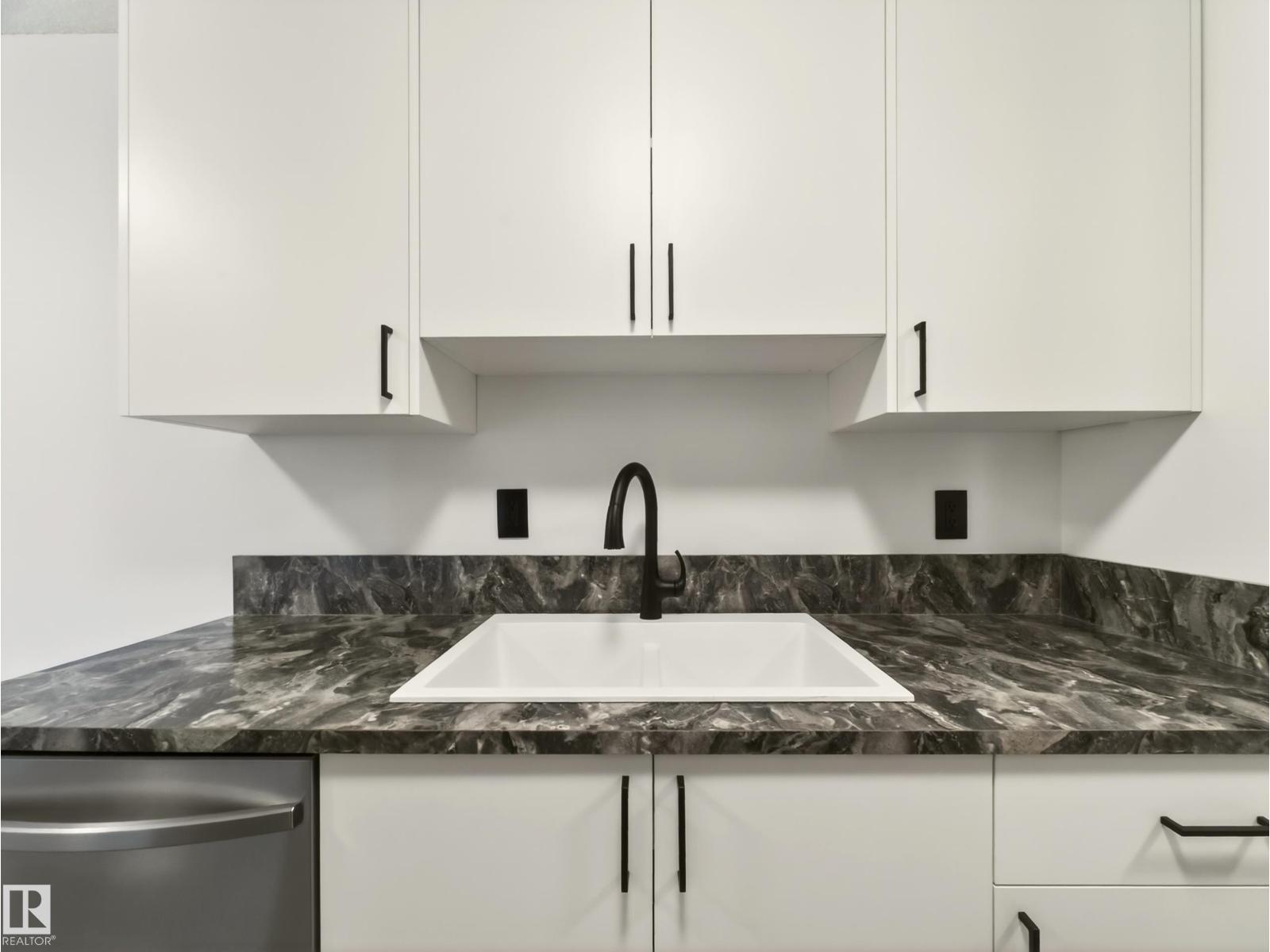 #223 15105 121 ST NW