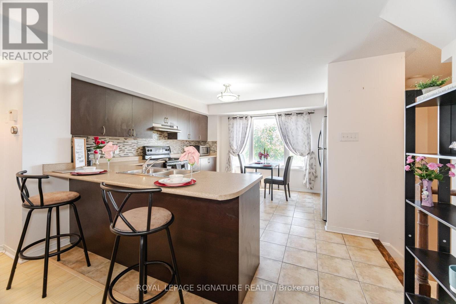 3 - 4855 HALF MOON GROVE