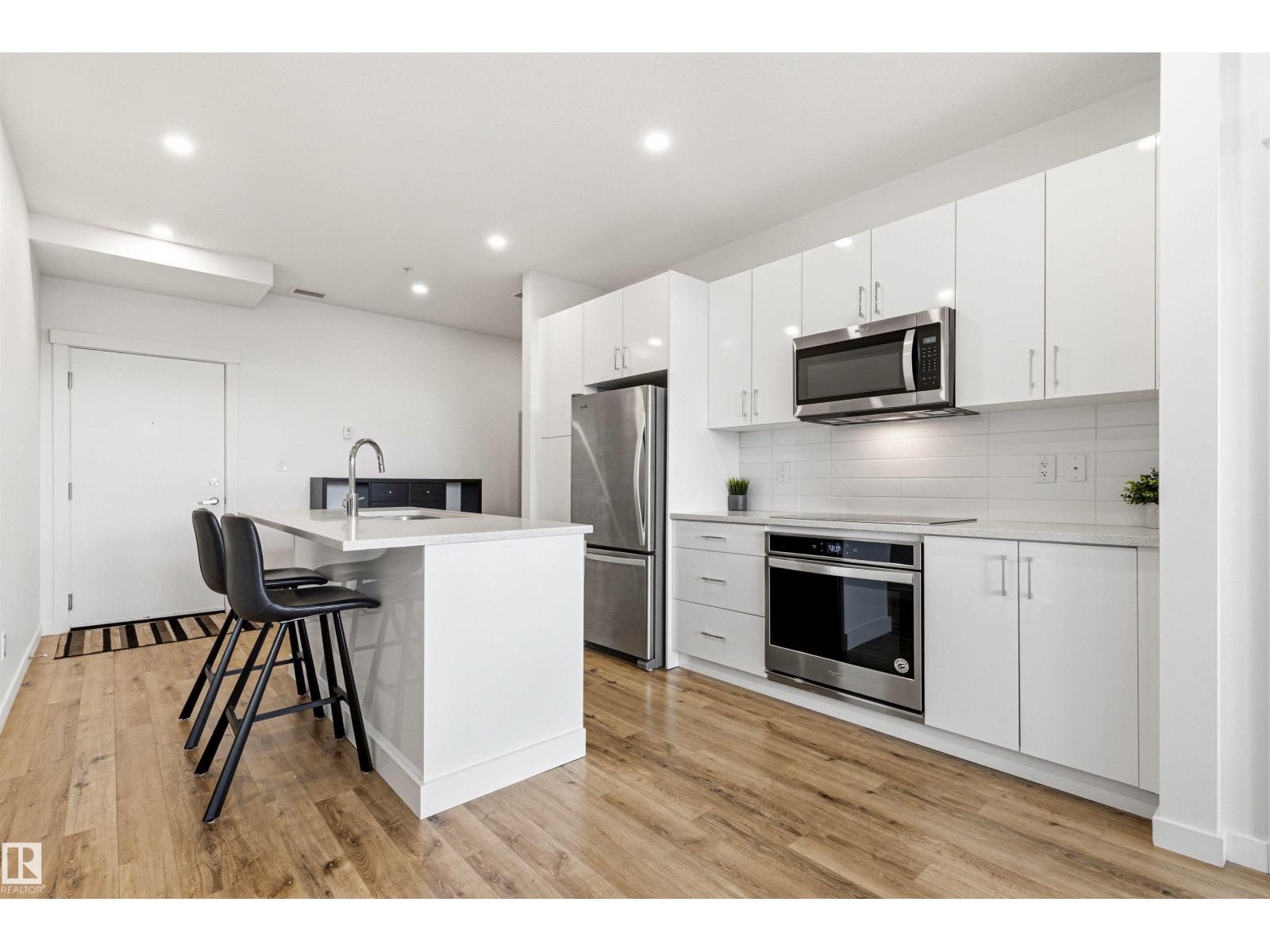#413 11503 76 AV NW