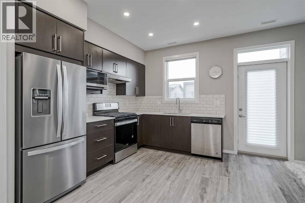 203, 130 Redstone Walk NE