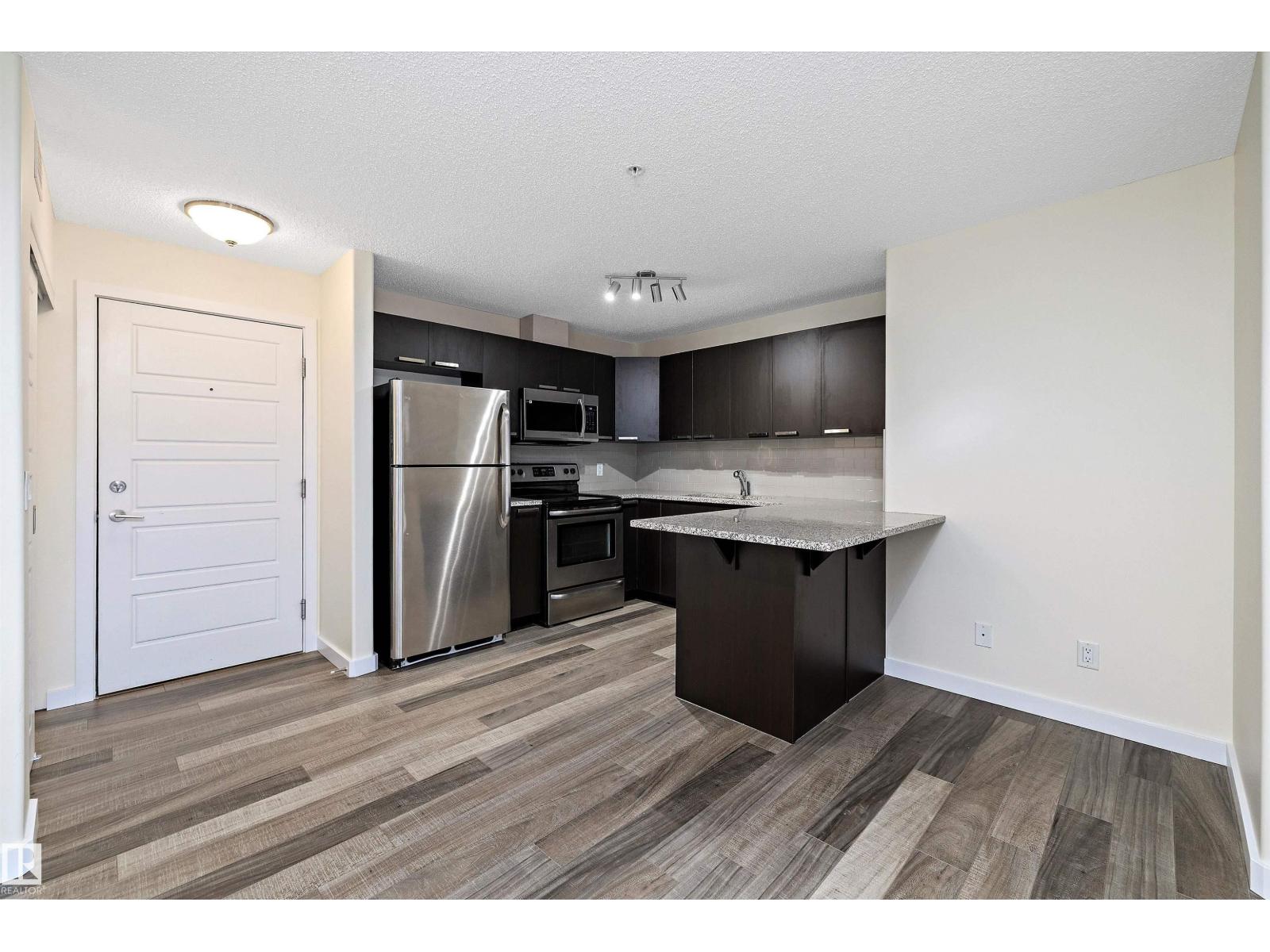 #323 14808 125 ST NW