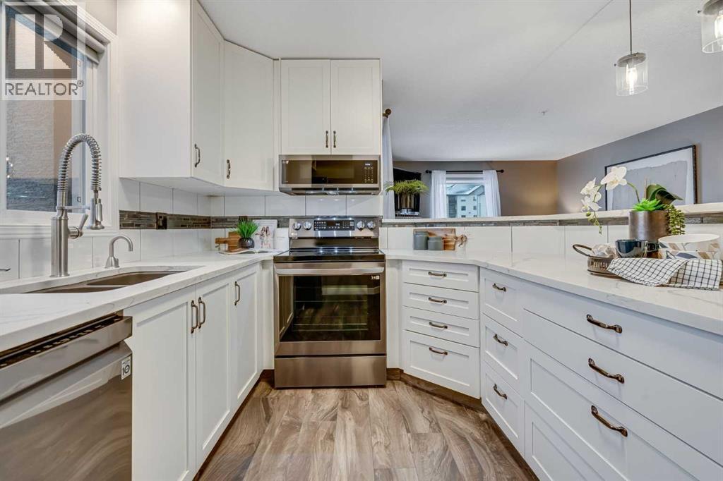 8128, 304 Mackenzie Way SW