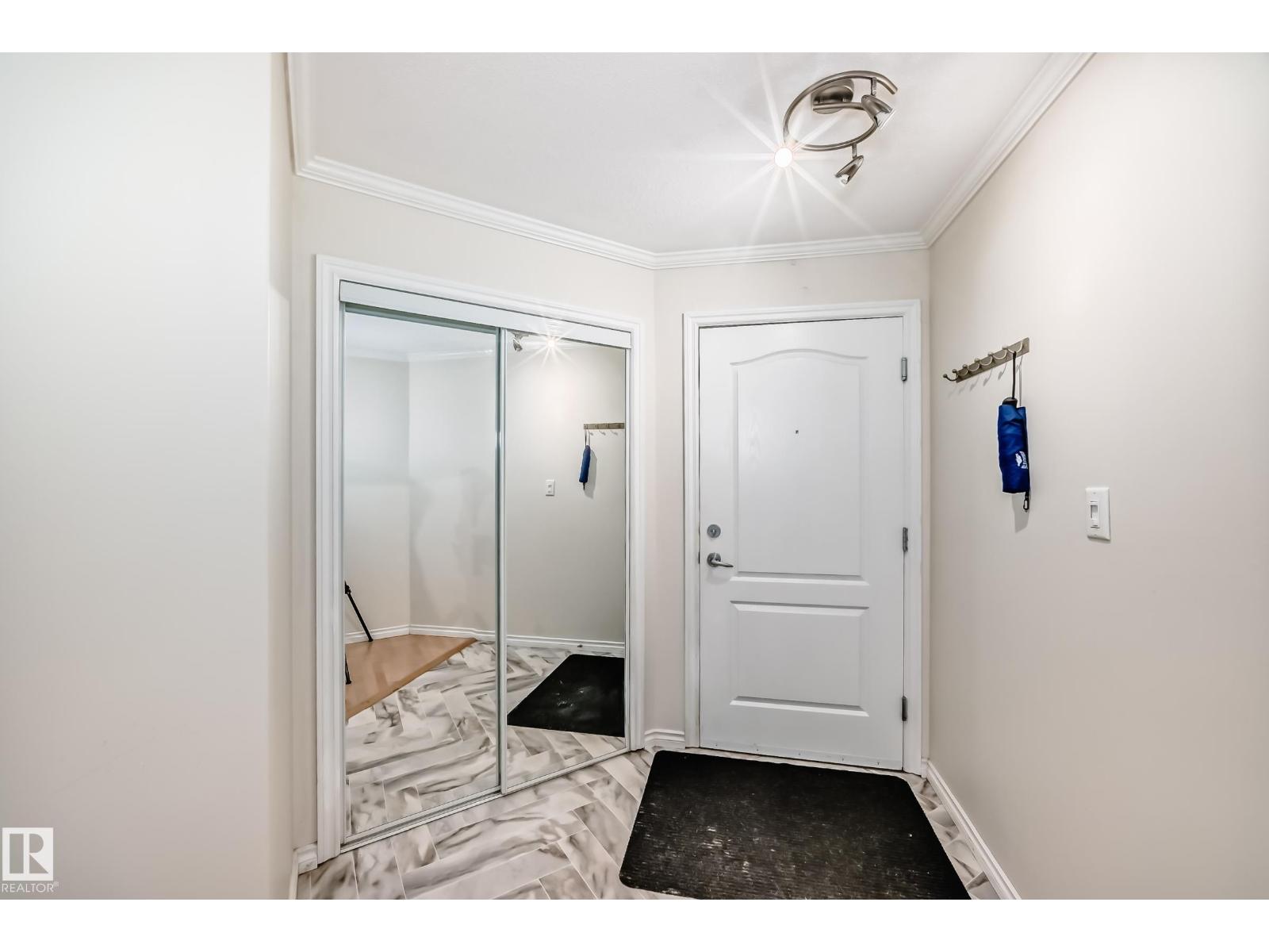 #214 9938 104 ST NW