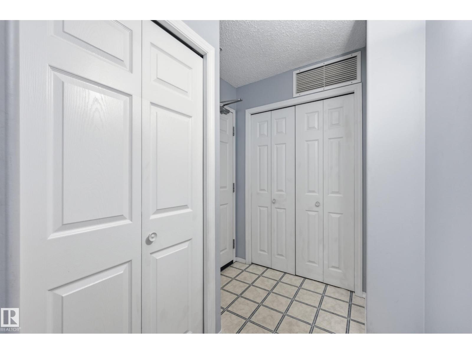 #203 11103 84 AV NW