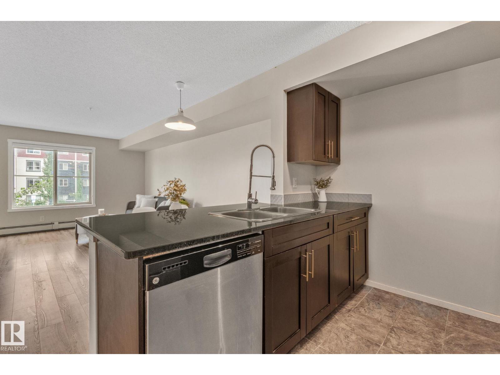 #210 5804 MULLEN PL NW