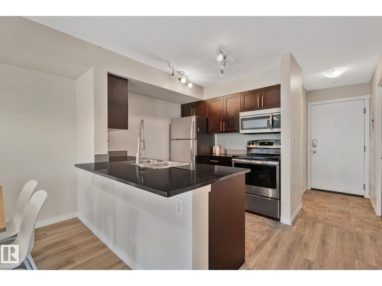 #210 5804 MULLEN PL NW