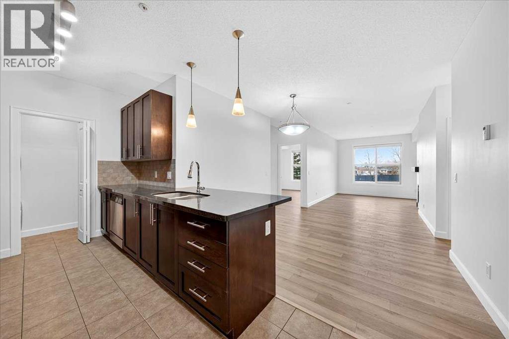 103, 88 Arbour Lake Road NW